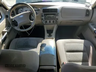 2003 Ford Explorer Sport Trac XLS with VIN 1FMZU77E43UB74698, listed as a Copart auction lot 54210645 with 207,678 mi miles and Salvage title. Bid and sale history available at DreamBid. Image 8.