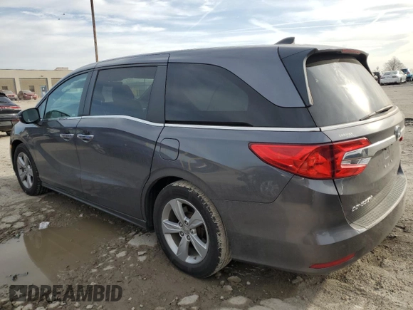 2019 Honda Odyssey EX-L with VIN 5FNRL6H75KB042882, listed as a Copart auction lot 49589845 with 90,835 mi miles and Salvage Title. Bid and sale history available at DreamBid. Image 2.
