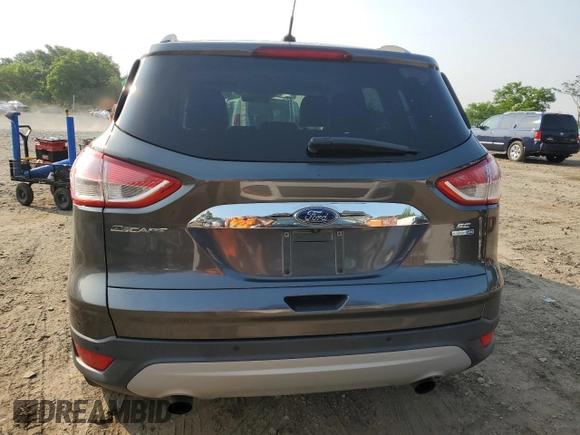 2016 Ford Escape SE с VIN 1FMCU9GX9GUB02078, выставлен на аукционе Copart как лот 60574845 с пробегом 99 056 миль миль и Чистый • Clean title. История ставок и продаж доступна на DreamBid. Изображение 6.