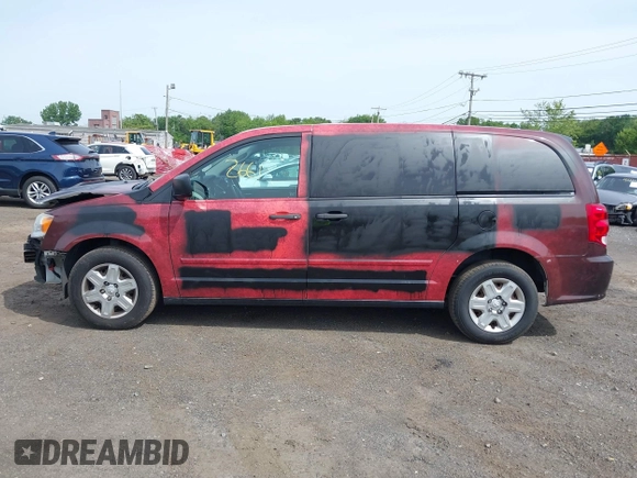 2013 Ram Cargo Van Tradesman with VIN 2C4JRGAG3DR735792, listed as a IAAI auction lot 42342661 with 82,676 mi miles and . Bid and sale history available at DreamBid. Image 14.