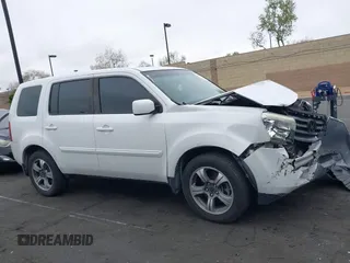 2015 Honda Pilot SE z VIN 5FNYF3H31FB005140, wystawiony jako IAAI lot #42081541 z przebiegiem 182 557 mil mil oraz . Historia ofert i sprzedaży dostępna na DreamBid. Obrazek 13.