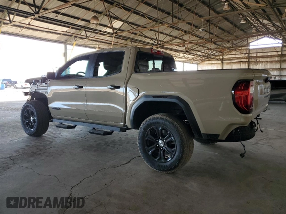 2023 GMC Canyon 2WD Elevation with VIN 1GTP5BEK7P1248837, listed as a Copart auction lot 77825924 with 6,793 mi miles and Salvage Title. Bid and sale history available at carsss.com. Image 2.