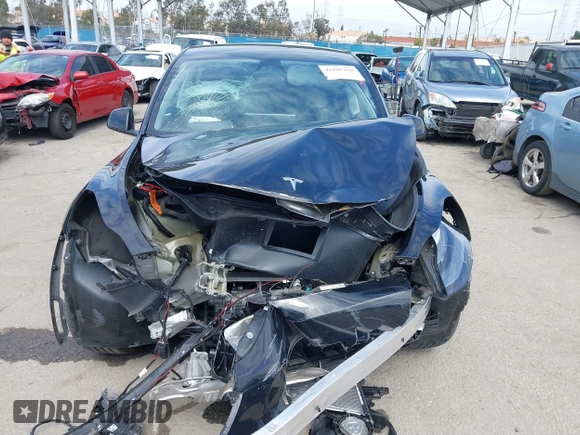 2023 Tesla Model Y Long Range z VIN 7SAYGDEE2PF863200, wystawiony jako IAAI lot #41805168 z przebiegiem 25 480 mil mil oraz . Historia ofert i sprzedaży dostępna na DreamBid. Obrazek 13.