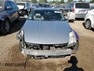 2004 Nissan 350Z Touring with VIN JN1AZ34D64T151960, listed as a Copart auction lot 69607824 with 106,607 mi miles and Salvage Title. Bid and sale history available at carsss.com. Image 5.