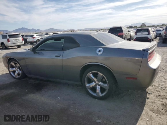 2012 Dodge Challenger R/T z VIN 2C3CDYBT2CH268592, wystawiony jako Copart lot #53143395 z przebiegiem 101 390 mil mil oraz Szkoda całkowita • Salvage title. Historia ofert i sprzedaży dostępna na DreamBid. Obrazek 2.