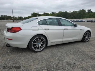 2015 BMW 6 Series 650i with VIN WBA6B2C57FGB99135, listed as a Copart auction lot 72610904 with 99,137 mi miles and Salvage Title. Bid and sale history available at carsss.com. Image 3.