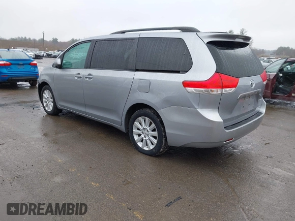 2012 Toyota Sienna LE with VIN 5TDJK3DCXCS040253, listed as a IAAI auction lot 41957623 with 164,780 mi miles. Bid and sale history available at carsss.com. Image 3.