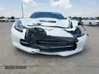 2014 Chevrolet Corvette Z51 3LT z VIN 1G1YM2D73E5131825, wystawiony jako Copart lot #58187765 z przebiegiem 89 861 mil mil oraz Szkoda całkowita • Salvage title. Historia ofert i sprzedaży dostępna na DreamBid. Obrazek 5.