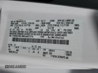 2011 Ford Econoline Passenger XL with VIN 1FBNE3BL4BDA67376, listed as a Copart auction lot 41890935 with 171,949 mi miles and Salvage Title. Bid and sale history available at carsss.com. Image 13.