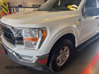2021 Ford F-150 XL with VIN 1FTFX1E51MKF07502, listed as a IAAI auction lot 42737762 with 90,272 mi miles and . Bid and sale history available at DreamBid. Image 13.