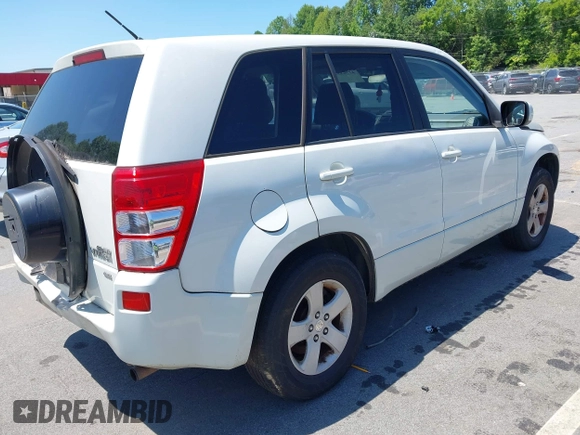 2011 Suzuki Grand Vitara Premium z VIN JS3TD0D2XB4103016, wystawiony jako IAAI lot #42568549 z przebiegiem 156 595 mil mil oraz . Historia ofert i sprzedaży dostępna na DreamBid. Obrazek 4.