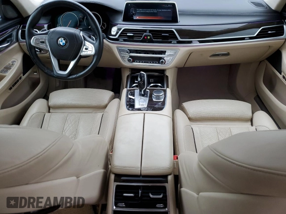 2016 BMW 7 Series 750i with VIN WBA7F0C54GGL99661, listed as a Copart auction lot 71742154 with 104,498 mi miles and Salvage Title. Bid and sale history available at carsss.com. Image 8.