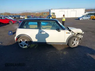 2004 MINI Hardtop with VIN WMWRC33464TJ58388, listed as a IAAI auction lot 40827409 with 102,322 mi miles and . Bid and sale history available at DreamBid. Image 13.