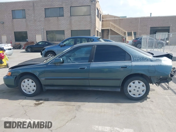 1996 Honda Accord LX with VIN 1HGCD5636TA182464, listed as a IAAI auction lot 41867521 with 191,832 mi miles and . Bid and sale history available at carsss.com. Image 15.
