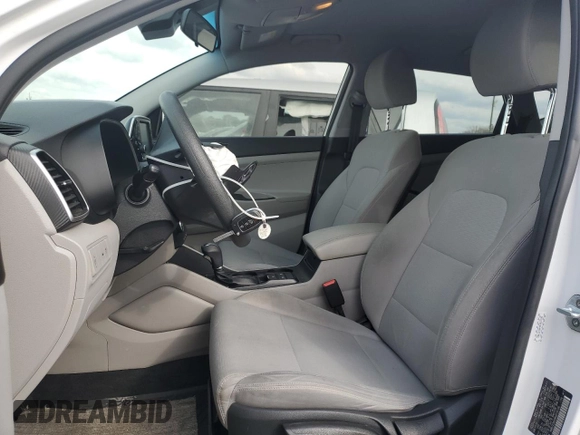 2019 Hyundai Tucson SE with VIN KM8J23A49KU018196, listed as a Copart auction lot 46933035 with 71,121 mi miles and Salvage Title. Bid and sale history available at carsss.com. Image 7.