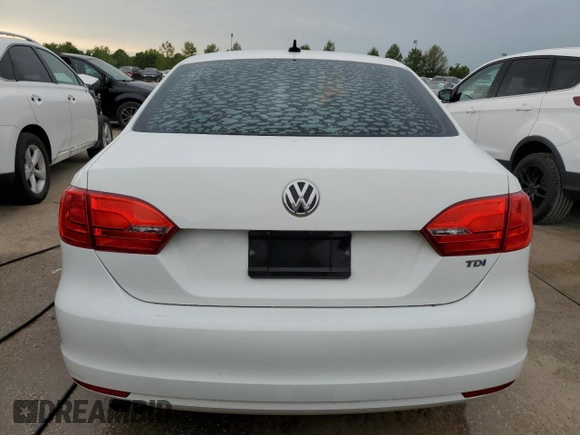 2014 Volkswagen Jetta TDI w/Premium with VIN 3VWLL7AJ2EM410482, listed as a Copart auction lot 53691984 with 77,421 mi miles and Salvage title. Bid and sale history available at DreamBid. Image 6.