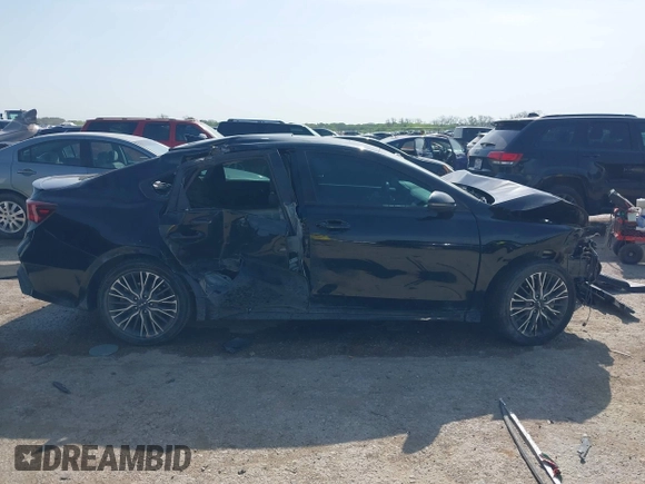 2023 Kia Forte GT-Line z VIN 3KPF54AD6PE670383, wystawiony jako IAAI lot #42020078 z przebiegiem 26 169 mil mil oraz . Historia ofert i sprzedaży dostępna na DreamBid. Obrazek 14.