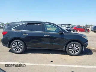 2016 Acura MDX Technology z VIN 5FRYD4H48GB047664, wystawiony jako IAAI lot #42149160 z przebiegiem 132 754 mil mil oraz . Historia ofert i sprzedaży dostępna na DreamBid. Obrazek 14.