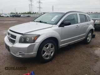 2009 Dodge Caliber SXT z VIN 1B3HB48A59D184747, wystawiony jako Copart lot #57501185 z przebiegiem 187 327 mil mil oraz Szkoda całkowita • Salvage title. Historia ofert i sprzedaży dostępna na DreamBid. Obrazek 1.