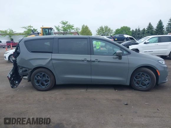 2022 Chrysler Pacifica Hybrid Limited with VIN 2C4RC1S74NR212475, listed as a IAAI auction lot 42264228 with 48,839 mi miles and . Bid and sale history available at DreamBid. Image 13.