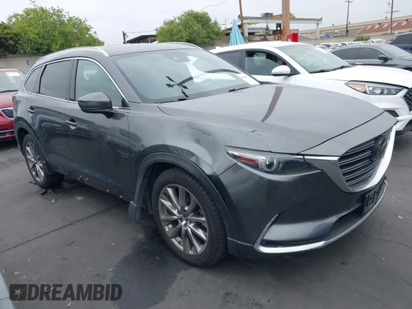 2018 Mazda CX-9 Grand Touring with VIN JM3TCBDY1J0200183, listed as a IAAI auction lot 42408132 with 69,023 mi miles and . Bid and sale history available at DreamBid. Image 1.
