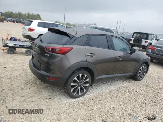 2019 Mazda CX-3 Touring z VIN JM1DKDC71K1408158, wystawiony jako Copart lot #50463675 z przebiegiem 95 578 mil mil oraz Czysty tytuł • Clean title. Historia ofert i sprzedaży dostępna na DreamBid. Obrazek 3.