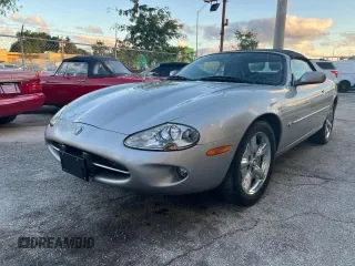 1999 Jaguar XK z VIN SAJGX204XXC041660, wystawiony jako Copart lot #88755785 z przebiegiem 70 091 mil mil oraz Tytuł czysty. Historia ofert i sprzedaży dostępna na DreamBid. Obrazek 2.