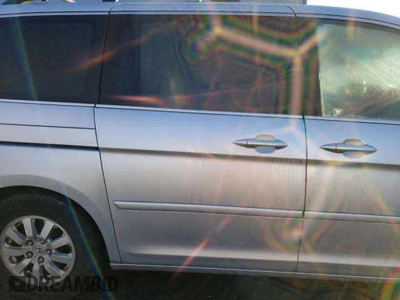 2010 Honda Odyssey EX-L with VIN 5FNRL3H60AB012029, listed as a Copart auction lot 41466155 with 175,048 mi miles and Salvage Title. Bid and sale history available at carsss.com. Image 11.