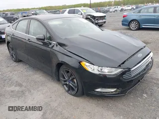 2018 Ford Fusion S z VIN 3FA6P0G75JR255727, wystawiony jako IAAI lot #42075542 z przebiegiem 125 611 mil mil oraz . Historia ofert i sprzedaży dostępna na DreamBid. Obrazek 1.