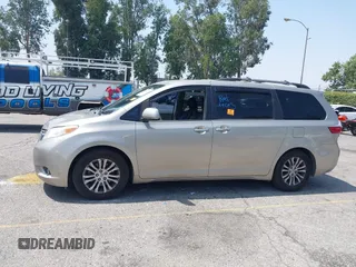 2015 Toyota Sienna XLE with VIN 5TDYK3DC4FS560743, listed as a IAAI auction lot 42488745 with 145,009 mi miles and . Bid and sale history available at DreamBid. Image 14.