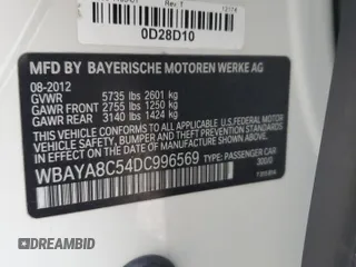 2013 BMW 7 Series 750i with VIN WBAYA8C54DC996569, listed as a Copart auction lot 74199774 with 107,871 mi miles and Salvage Title. Bid and sale history available at DreamBid. Image 12.