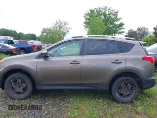 2013 Toyota RAV4 LE with VIN 2T3BFREV2DW077017, listed as a IAAI auction lot 42456065 with 164,811 mi miles and . Bid and sale history available at DreamBid. Image 14.