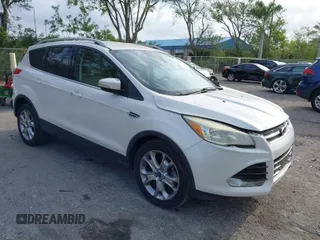 2015 Ford Escape Titanium with VIN 1FMCU0JX1FUC31418, listed as a IAAI auction lot 41900497 with 91,304 mi miles. Bid and sale history available at carsss.com. Image 1.