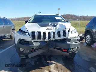 2018 Jeep Cherokee Trailhawk with VIN 1C4PJMBX7JD550173, listed as a IAAI auction lot 41094306 with 74,128 mi miles. Bid and sale history available at carsss.com. Image 12.