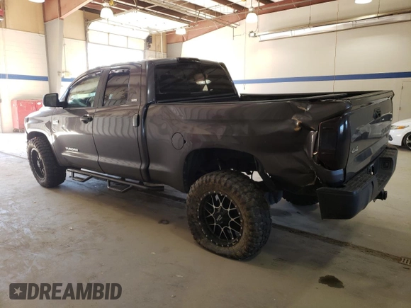 2016 Toyota Tundra SR z VIN 5TFUY5F11GX563129, wystawiony jako Copart lot #87130784 z przebiegiem 159 350 mil mil oraz Szkoda całkowita • Salvage title. Historia ofert i sprzedaży dostępna na DreamBid. Obrazek 2.