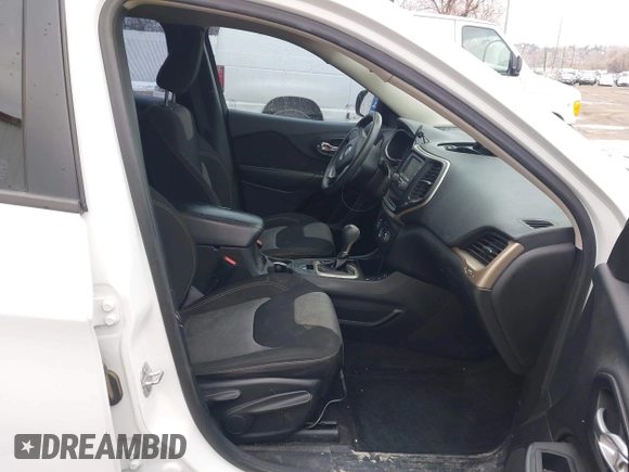 2016 Jeep Cherokee Altitude with VIN 1C4PJLAB8GW108225, listed as a IAAI auction lot 41664092 with 142,588 mi miles and . Bid and sale history available at DreamBid. Image 5.