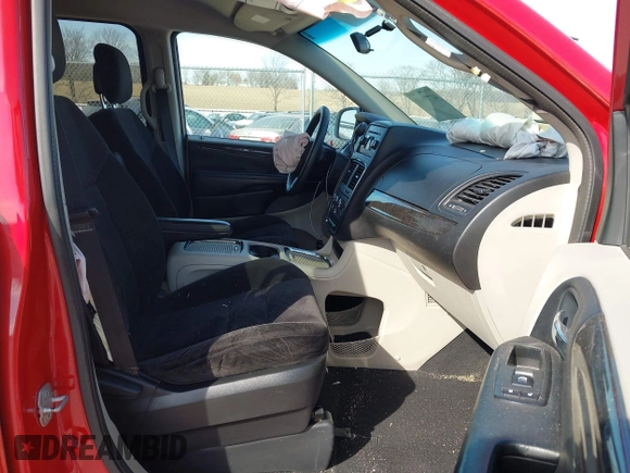 2014 Dodge Grand Caravan SXT with VIN 2C4RDGCG6ER477008, listed as a IAAI auction lot 41770610 with 89,843 mi miles and . Bid and sale history available at DreamBid. Image 5.