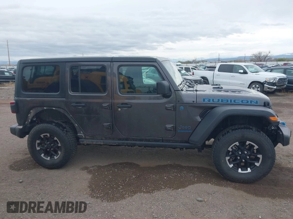 2024 Jeep Wrangler Rubicon z VIN 1C4RJXR67RW276710, wystawiony jako IAAI lot #42047318 z przebiegiem 35 857 mil mil oraz . Historia ofert i sprzedaży dostępna na DreamBid. Obrazek 13.