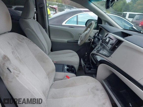 2014 Toyota Sienna LE AAS with VIN 5TDKK3DC3ES506466, listed as a IAAI auction lot 41908023 with 118,297 mi miles and . Bid and sale history available at carsss.com. Image 5.