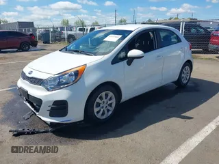 2016 Kia Rio LX with VIN KNADM5A37G6676302, listed as a IAAI auction lot 41937880 with 51,599 mi miles and . Bid and sale history available at DreamBid. Image 2.