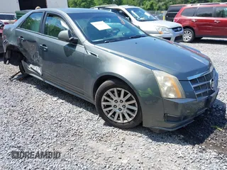 2011 Cadillac CTS Luxury z VIN 1G6DG5EY3B0147590, wystawiony jako IAAI lot #42620892 z przebiegiem 144 202 mil mil oraz . Historia ofert i sprzedaży dostępna na DreamBid. Obrazek 1.