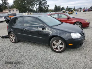 2009 Volkswagen Rabbit S with VIN WVWBB71K89W037593, listed as a Copart auction lot 74941614 with 51,645 mi miles and Salvage title. Bid and sale history available at DreamBid. Image 4.