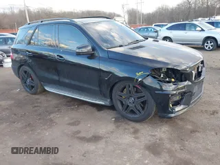 2014 Mercedes-Benz M 63 AMG z VIN 4JGDA7EBXEA306024, wystawiony jako IAAI lot #41452811 z przebiegiem 98 510 mil mil oraz . Historia ofert i sprzedaży dostępna na DreamBid. Obrazek 1.