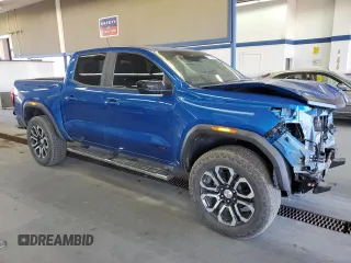 2024 GMC Canyon 4WD AT4 with VIN 1GTP6DEK3R1114273, listed as a Copart auction lot 71103464 with 5,549 mi miles and Salvage Title. Bid and sale history available at carsss.com. Image 4.