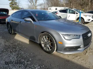 2017 Audi A7 Premium Plus with VIN WAUW2AFCXHN023910, listed as a Copart auction lot 86535324 with 63,793 mi miles and Salvage title. Bid and sale history available at DreamBid. Image 4.