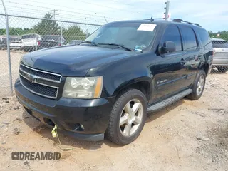 2007 Chevrolet Tahoe LT z VIN 1GNFK13057R237666, wystawiony jako IAAI lot #42271427 z przebiegiem 164 029 mil mil oraz . Historia ofert i sprzedaży dostępna na DreamBid. Obrazek 2.
