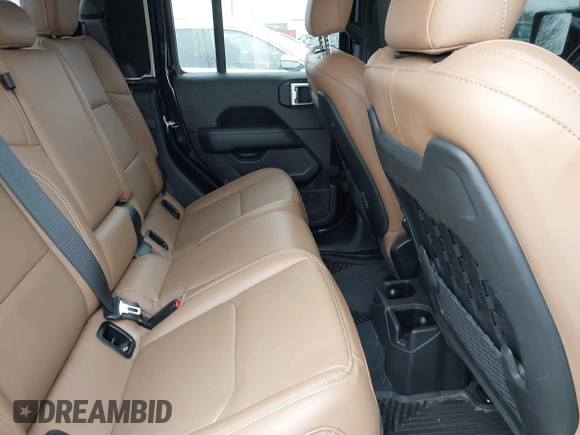 2022 Jeep Gladiator Rubicon with VIN 1C6JJTBG7NL145501, listed as a IAAI auction lot 41506842 with 20,593 mi miles and . Bid and sale history available at DreamBid. Image 8.
