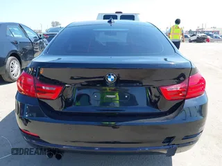 2016 BMW 4 Series 428i xDrive z VIN WBA4C9C58GG141210, wystawiony jako IAAI lot #42218036 z przebiegiem 88 864 mil mil oraz . Historia ofert i sprzedaży dostępna na DreamBid. Obrazek 16.