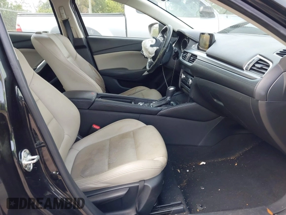 2016 Mazda Mazda6 i Touring with VIN JM1GJ1V53G1431880, listed as a IAAI auction lot 42079970 with 111,179 mi miles. Bid and sale history available at carsss.com. Image 5.