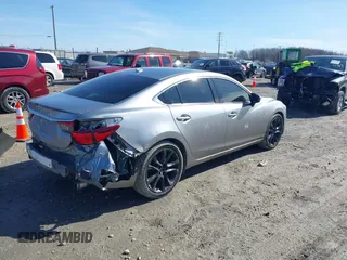 2015 Mazda 6 i Grand Touring with VIN JM1GJ1W68F1170459, listed as a IAAI auction lot 41759915 with 109,911 mi miles and . Bid and sale history available at DreamBid. Image 4.